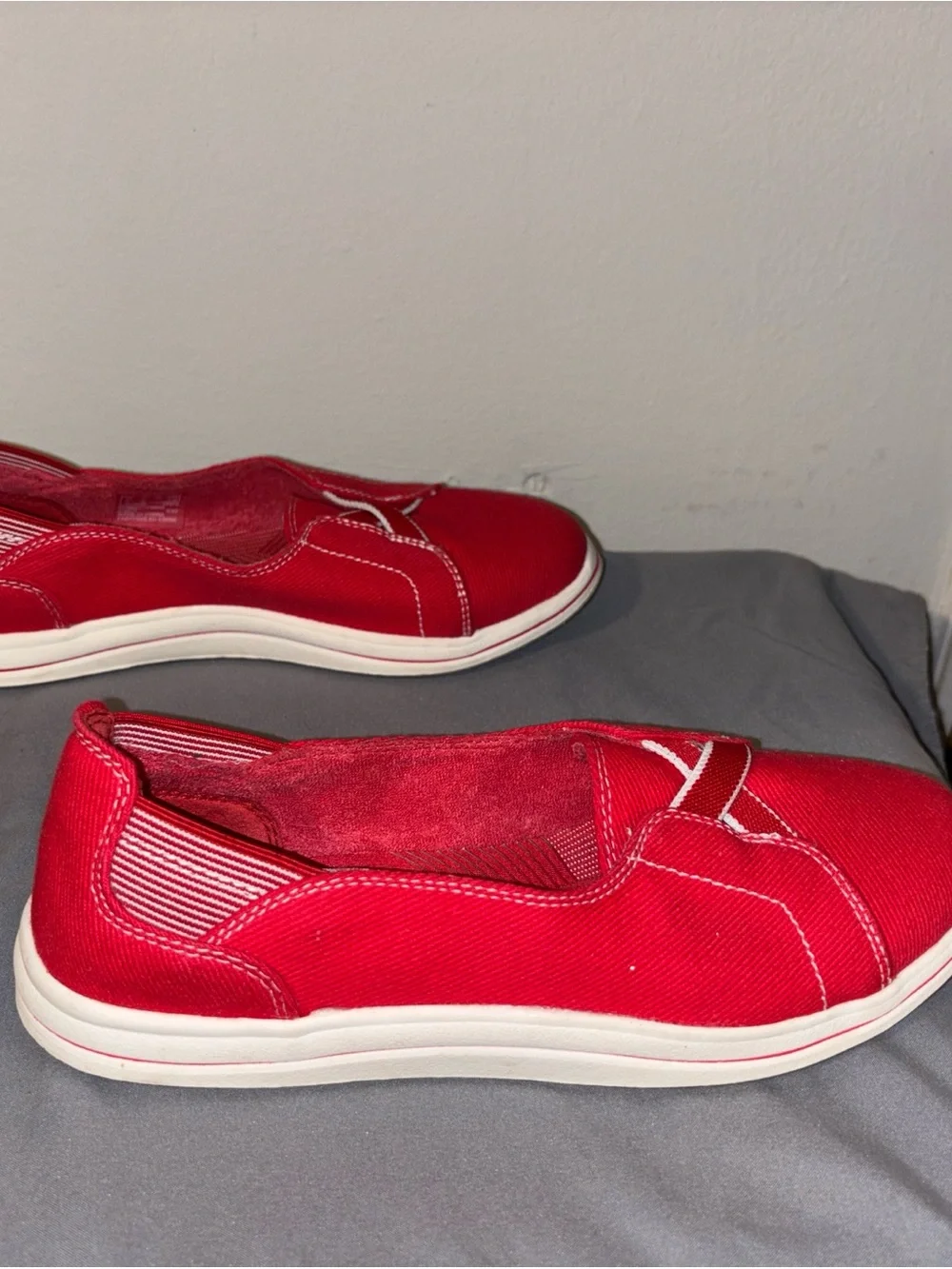 Clarks Women’s Red Slip-On Canvas Sneakers cloudsteppers